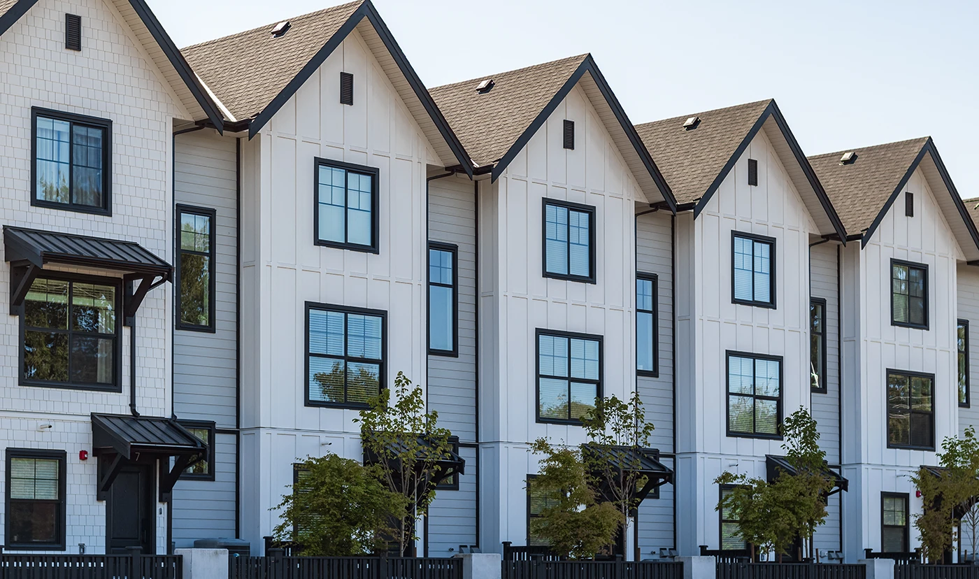 Townhome Row Row of white townhomes with dark trim