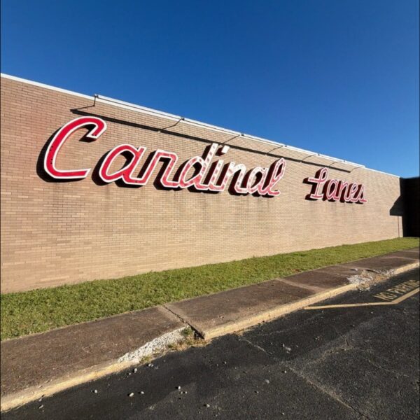 Full Cardinal Lanes wall sign after repainting the red and white letters